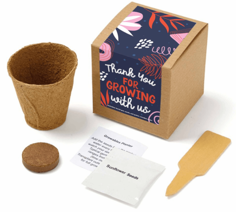 Grow-your-own plant kit with message reading, "Thank you for growing with us."